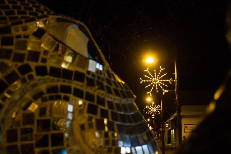 Snowflakes line the streets of downtown Ames this holiday season. 