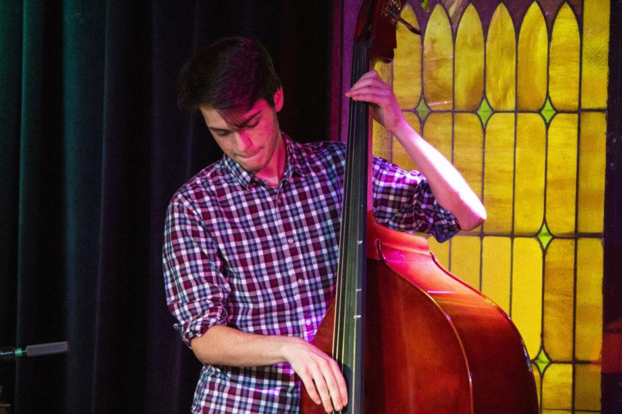 Sophomore Robert Walling freestyles on his bass as he preforms in the M-shop on Sep 12 as a part of the opening act.