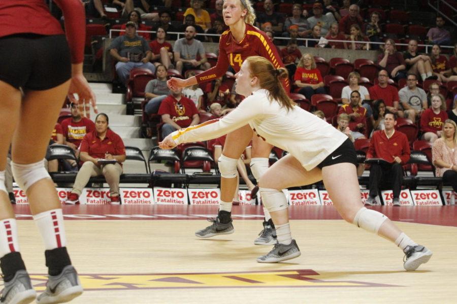 Hali Hillegas, defensive specialist, goes to hit the ball towards Ole Miss during the Aug. 24 game in Hilton Coliseum. Cyclones won 3-0.