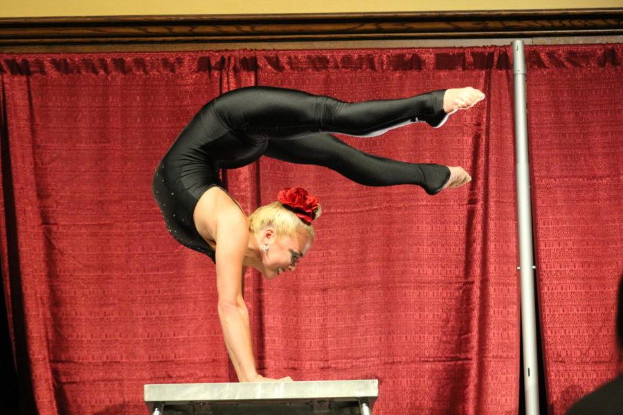 5th generation acrobat Viktoria Grimmy performs an act featuring strength, balance, and flexibility during The Great Dubois: Masters of Variety during ISU Afterdark at the Memorial Union, Sept. 8.