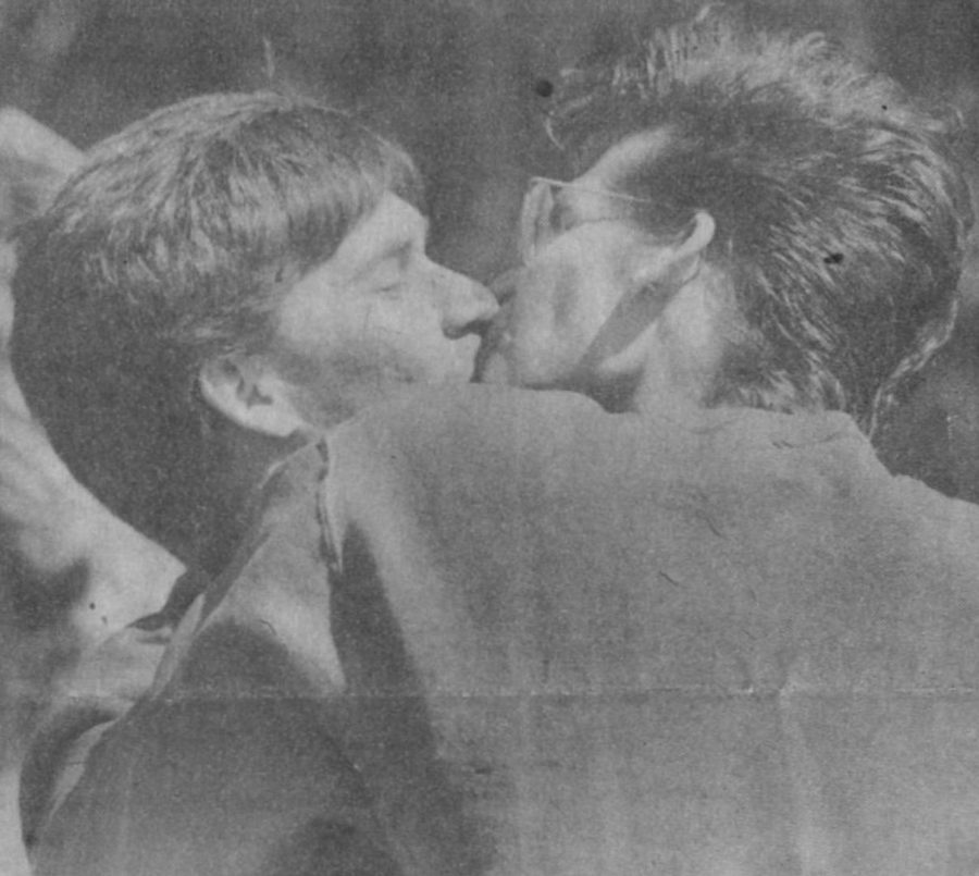Todd Bennett and Jay Larson participating in the 1991 kiss-in hosted by the Phi Alpha Gamma fraternity to challenge presumptions and stereotyping.