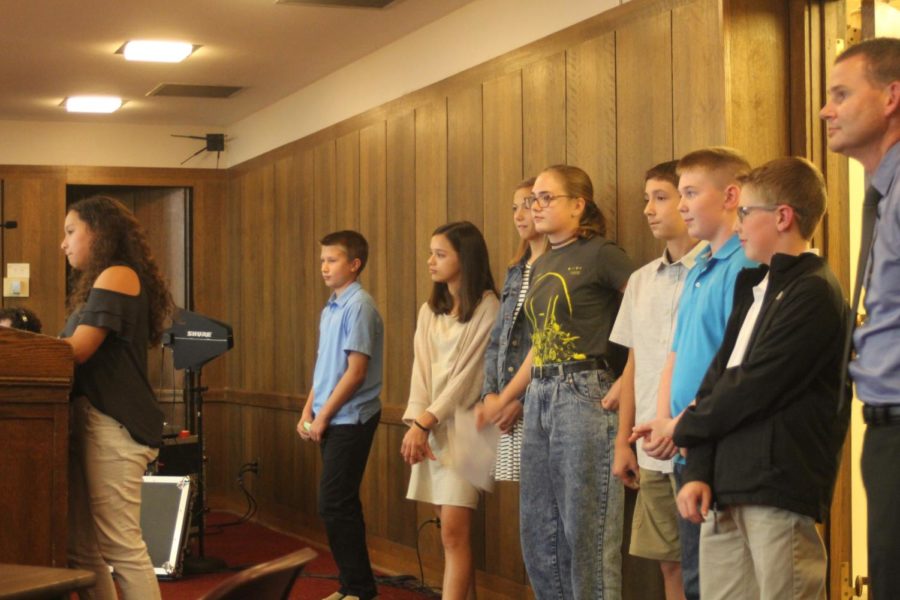 Members of the North Polk Middle School Student Council speak to the Senate about their proclamation. 