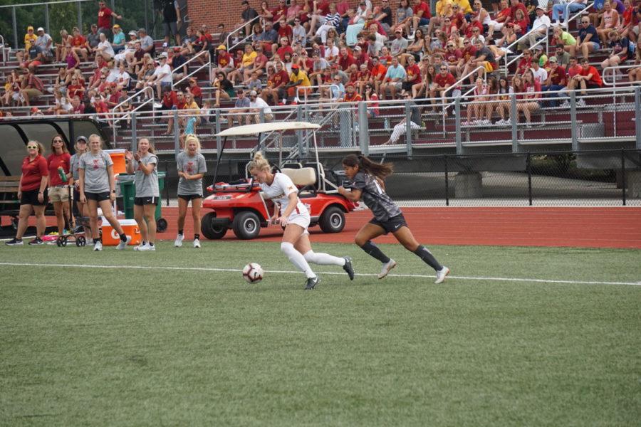 Sophomore Shealyn Sullivan races the ball down the field towards Missouris goal during the Iowa State vs Missouri game on August 19th. The Tigers beat the Cyclones in double overtime 2-1.