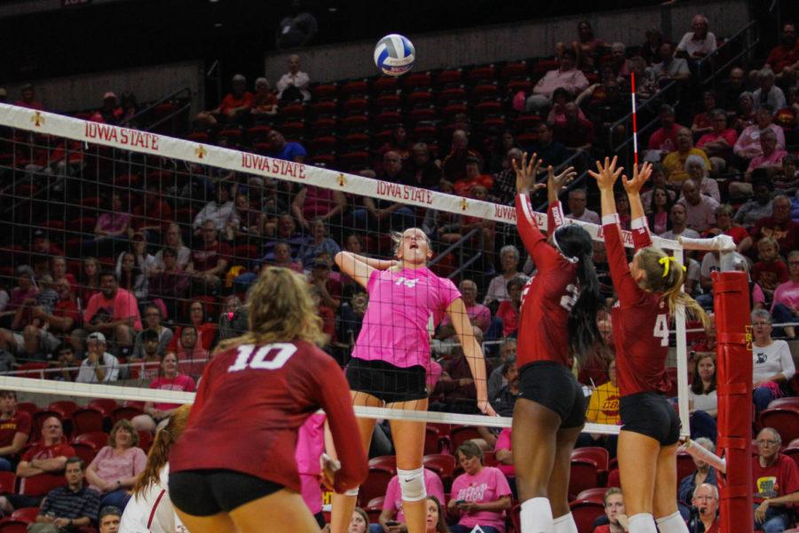 Senior Jess Schaben jumps to spike against the University of Oklahomas team during their match against the Sooners on Oct. 3 at the Hilton Coliseum. The Cyclones lost 3-1.