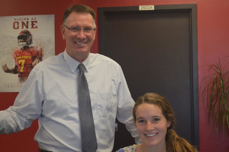New Iowa State dean of veterinary medicine Dan Grooms poses with a student. Grooms started his position as dean on Oct. 1.  
