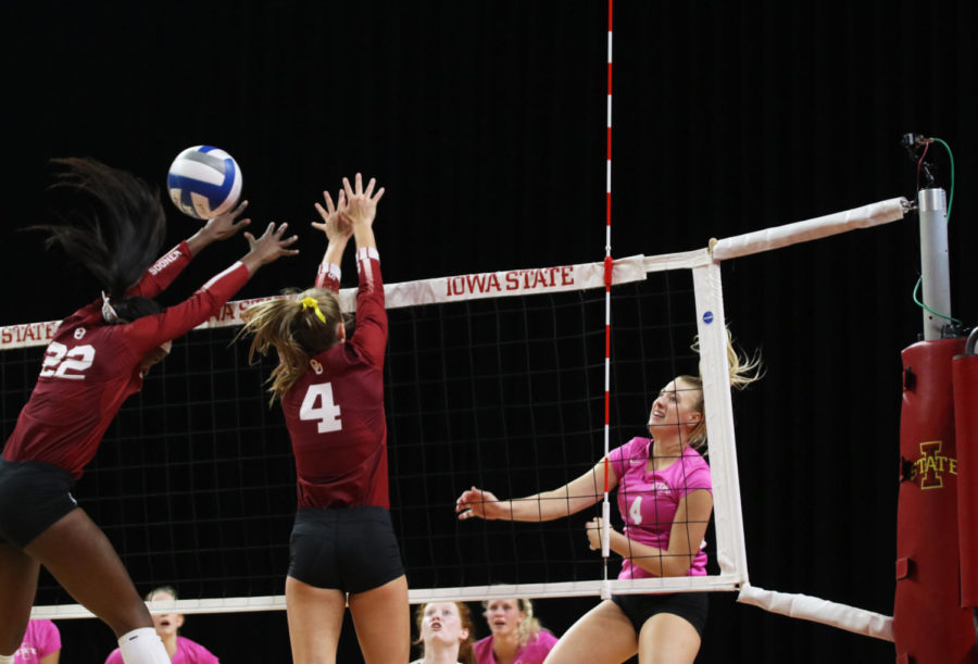 Outside hitter Josie Herbst spikes the ball during the volleyball game against University of Oklahoma at Hilton Coliseum on Oct. 3. The Cyclones lost 3-1.