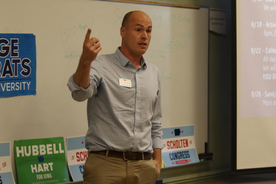 Congressional candidate J.D. Scholten speaks to members of ISU College Democrats at their first meeting of the year on Tuesday. Scholten asked the group for their help in building name recognition for the campaign. Scholten is challenging Steve King for his spot in congress.