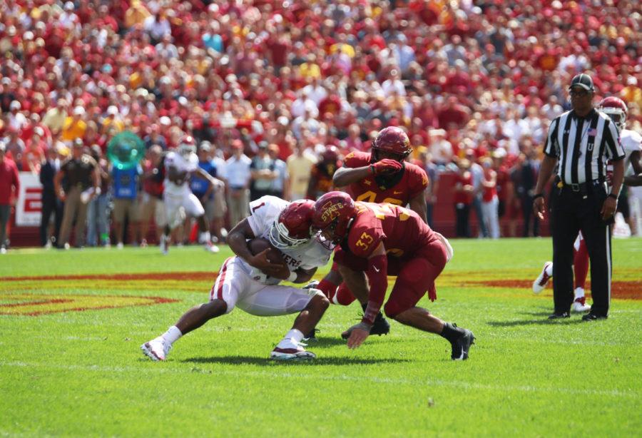 Defensive+back%2C+Braxton+Lewis%2C+stops+Oklahoma+Sooners+quarterback+Kyler+Murray+during+their+game+at+Jack+Trice+Stadium+on+Sept.+15.+The+Cyclones+lost+37-27.