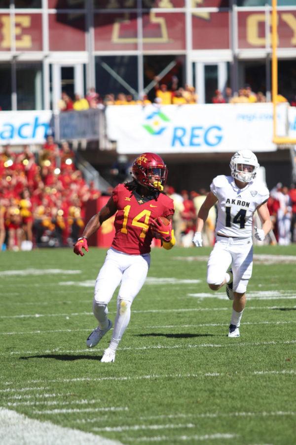 Wide+receiver%2C+Tarique+Milton%2C+runs+the+ball+down+the+field+during+the+football+game+against+University+of+Akron+at+Jack+Trice+Stadium+on+Sept.+22.+The+Cyclones+won+26-13.