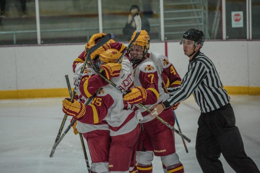 Cyclone Hockey players celebrate after scoring against Alabama Hockey on Oct. 5 at the Ames/ISU Ice Arena.