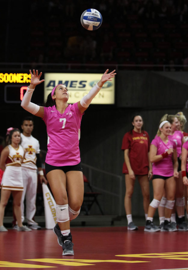 Defensive specialist Izzy Enna serves the ball during the volleyball game against the University of Oklahoma at Hilton Coliseum. The Cyclones lost 3-1.