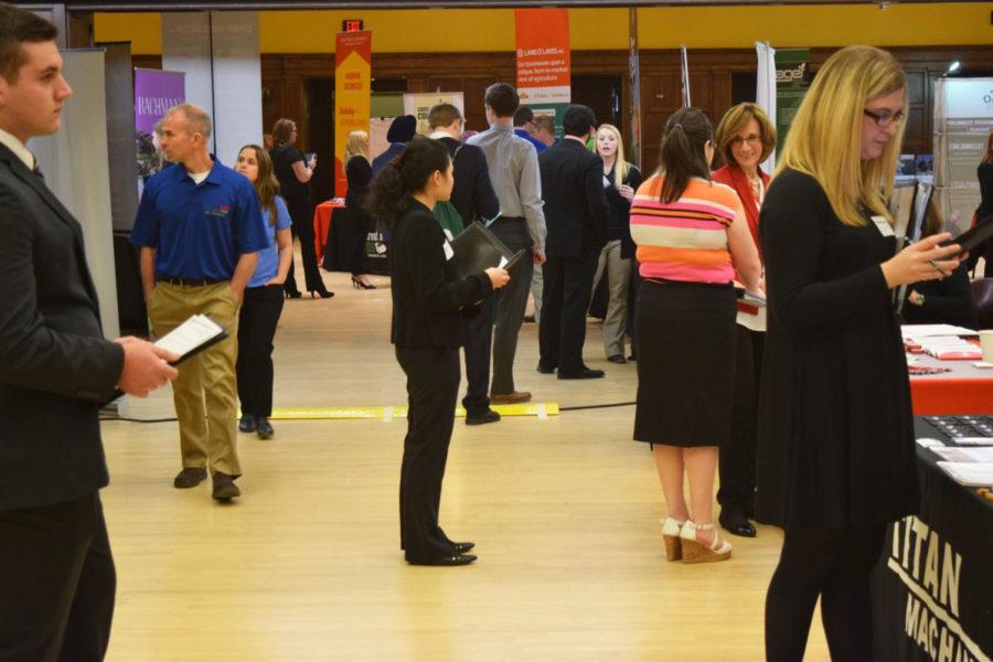 Students wait to speak with representatives from the 101 businesses that came to the College of Agriculture and Life Sciences Career Fair on Wednesday. The fair lasted from 10 a.m. to 2 p.m. on February 1 in the Great Hall of the Memorial Union. 