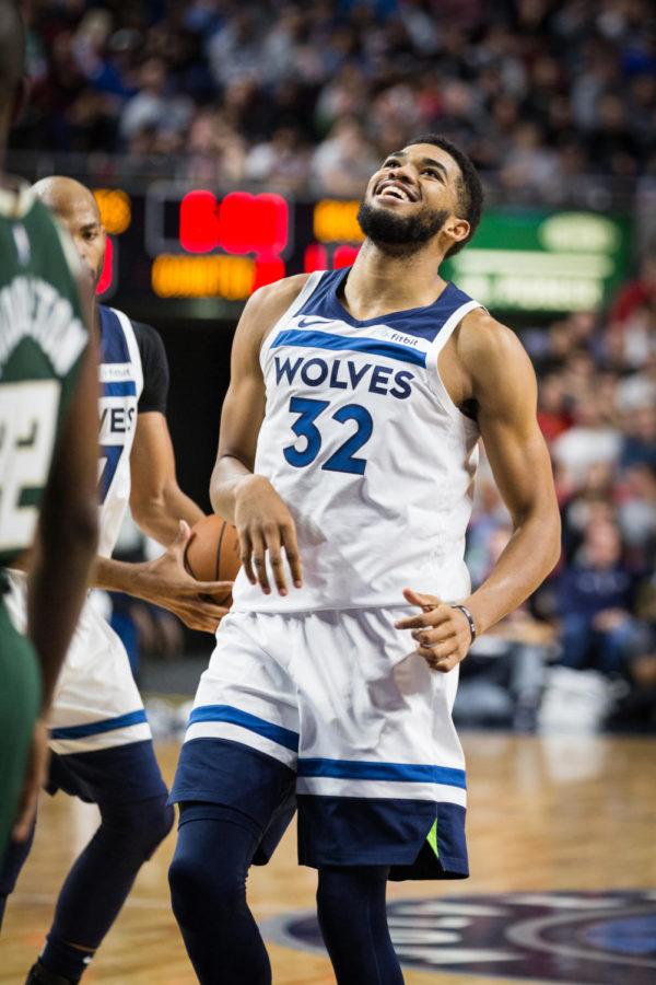 Timberwolves Forward-Center Karl-Anthony Towns smiles following a missed basket during the 1st half of the Minnesota vs Milwaukee Preseason game held in Hilton Coliseum Oct. 7, 2018. The Timberwolves were defeated 125-107.