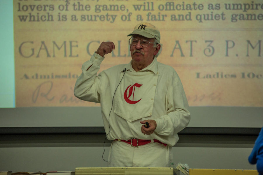 Historian John Liepa presents on the history of How Iowa Met Baseball in his replica Cincinnati Red Stockings Cricket Flannel uniform (circa 1869) at the Ames Public Library, Oct 23.