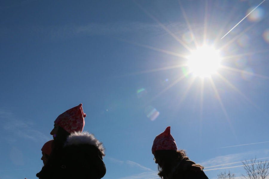 Women sport pink pussy hats during the second annual Womens March at the State Capitol in Des Moines on Jan. 20, 2018. The temperature at the event was nearly 50 degrees.