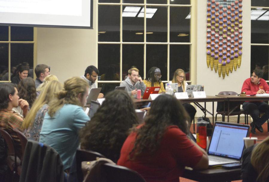 Members of Iowa State’s Student Government make their way through the night’s agenda during their meeting Oct. 24 in the Campanile room of the Memorial Union. The meeting centered on funding for Latinx Initiatives, Rodeo Club, seating at-large members to the finance committee and confirming members to the election commission.