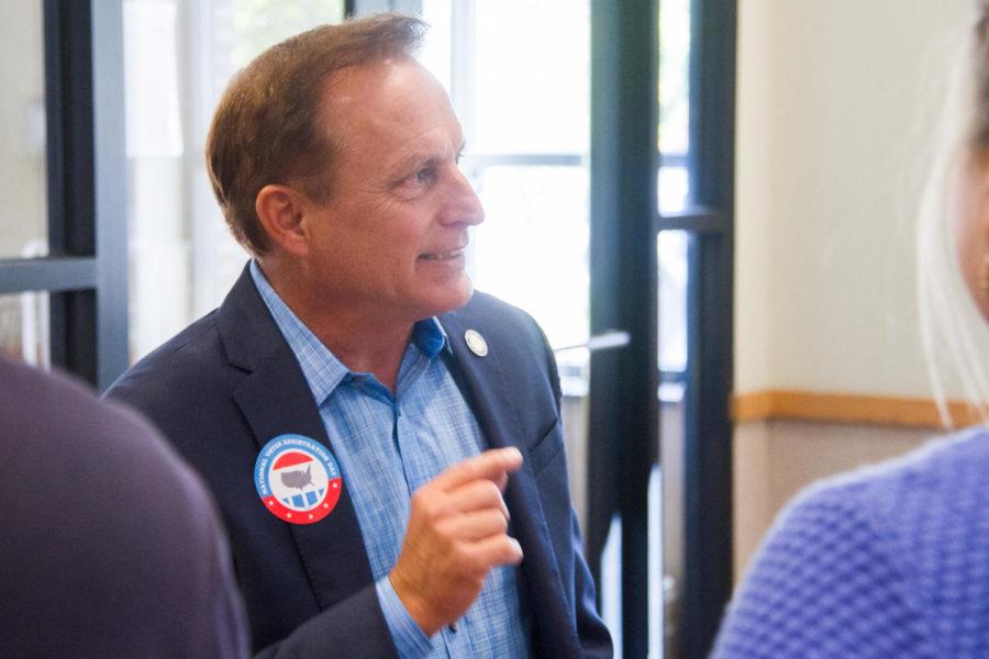 Iowa Secretary of State Paul Pate meets with voter registration volunteers, as part of National Voter Registration day, Sept. 27 in the UDCC. After briefly talking about the events of last night's presidential debate, Pate talked with the volunteers about the importance of voting, and the power a voter has.