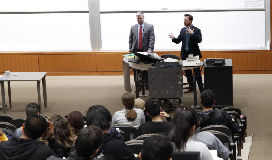 Jonathan Moore (left) and David Gluckman are immigration attorneys specializing on work visa petitions. They gave a seminar to Iowa State international students in the Gerdin Business Building Thursday night.