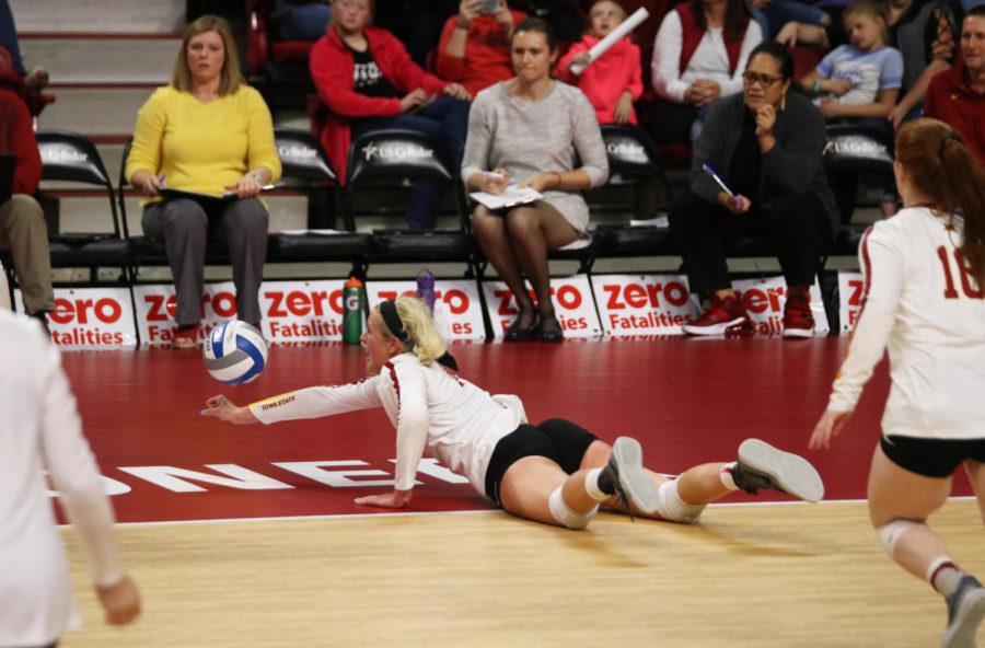 Outside hitter Jess Schaben dives to save the ball during the volleyball game against Kansas State at Hilton Coliseum on Oct. 26. The Cyclones won 3-1.