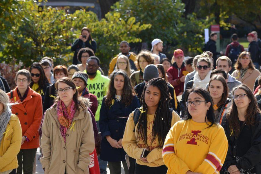 A group of people met outside Parks library for the Solidarity Walk With Womxn Oct. 24. The walk began at 11:30 a.m. and ended at the Sloss house at 12:30 p.m. Wednesday. 