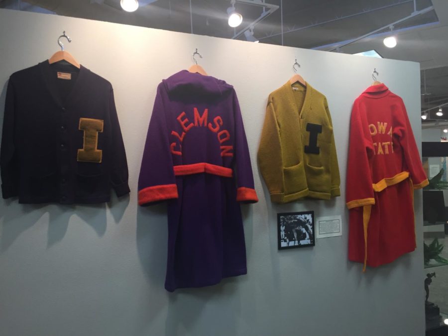 Wrestling robes and sweaters hanging in the National Wrestling Hall of Fame Dan Gable Museum in Waterloo, Iowa. The Iowa State robe was Nate Carrs. Carr wrestled in the early 80s for the Cyclones.