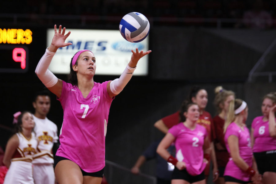 Defensive specialist Izzy Enna serves the ball during the volleyball game against University of Oklahoma at Hilton Coliseum on Oct. 3. The Cyclones lost 3-1.