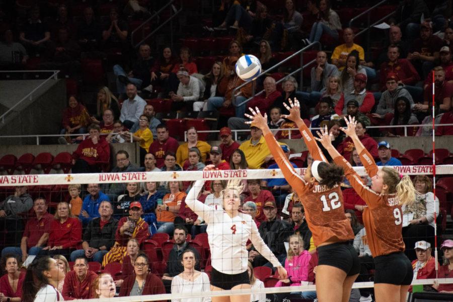 Outside hitter Josie Herbst goes for the spike against Texas on Oct. 24 at Hilton Coliseum. The Cyclones lost 3-0 to Texas. 
