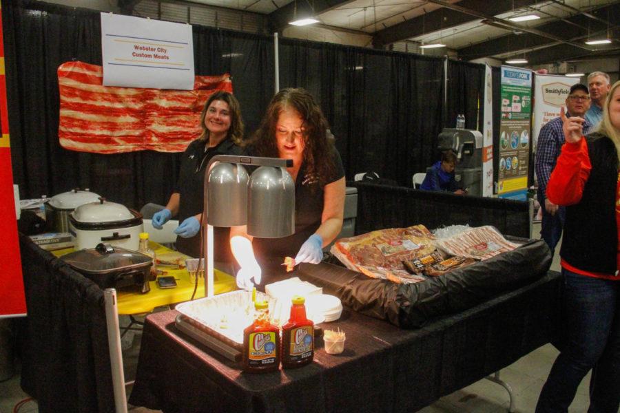 Webster City Custom Meats serve samples of pork brisket during the annual Bacon Expo at Hansen Agriculture Student Learning Center on Oct. 6. Many food vendors and restaurants attended the expo hoping to claim the Peoples Choice Award for best bacon at the Expo. 