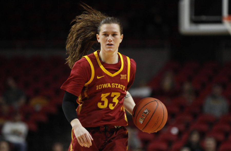 Redshirt+senior+Alexa+Middleton+looks+for+a+teammate+to+pass+to+during+the+game+against+the+Winona+State+Warriors+at+Hilton+Coliseum+on+Nov.+4.+The+Cyclones+won+73-39.