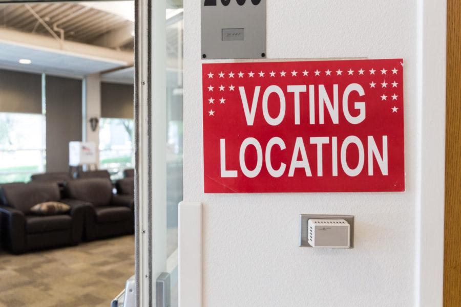 A sign is posted in Buchanan Hall on Lincoln Way to let Ames residents know it was a voting location for the Primary Elections on June 5.