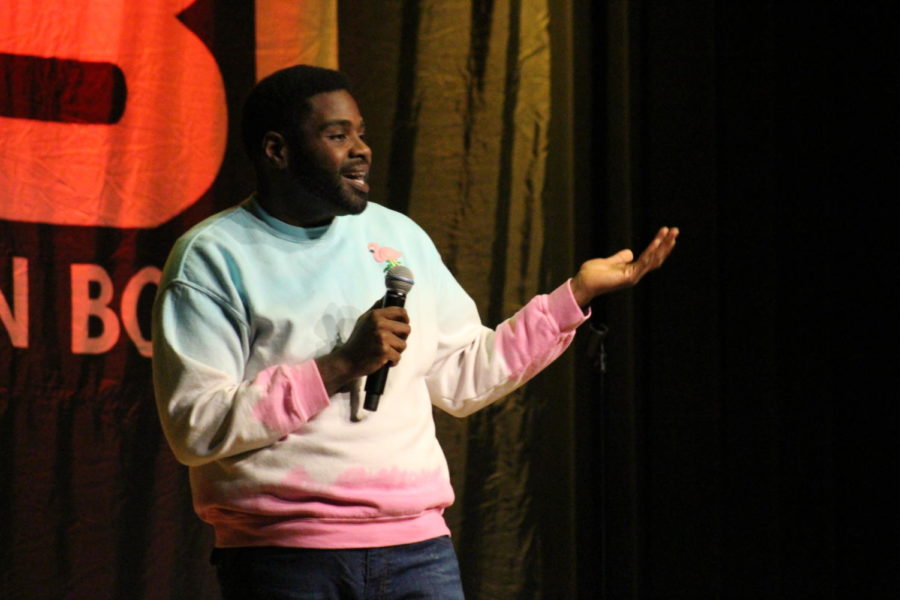 Ron Funches, star in NBCs Undateable, cracks jokes to the audience at ISU AfterDark in the Memorial Union on Nov. 2. Funches joked about Kum & Go, Dewayne the Rock Johnson, Lebron James, a Japanese toilet and more. The Beyoncé for boys, said Funches as he described Dewayne the Rock Johnson.