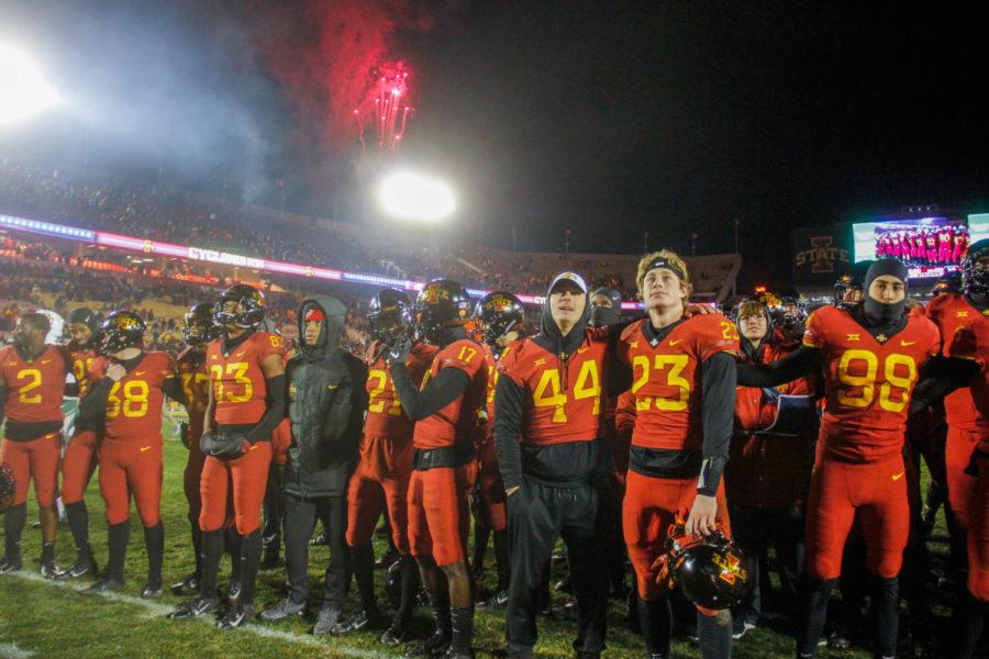 The Iowa State football team stands on the field watching fireworks after winning against the Baylor Bears on Nov. 10 at Jack Trice Stadium. The Cyclones beat the Bears 28-14.