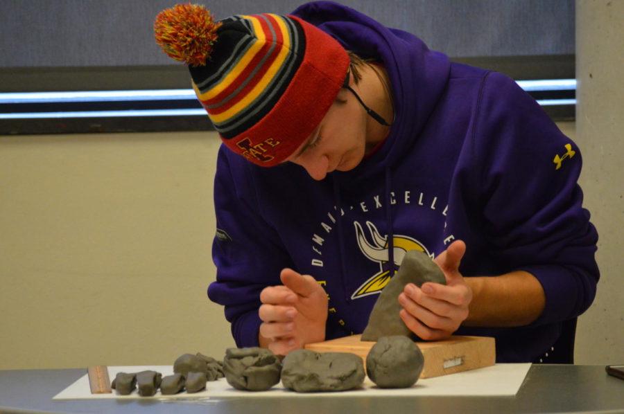 A sophomore in pre-biological and pre-medical illustrations, Nicholas Leaders works on sculpting his hand in the BPMI class Thursday November 8. Students have been working on sketches and measurements since late October and are now onto the sculpting process.