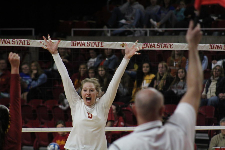 Then-freshman Eleanor Holthaus celebrates a point victory at the Iowa State vs. Texas volleyball game Oct. 24 at Hilton Coliseum. Holthaus has expanded her role from her freshman year and is now working on hitting from the back row.