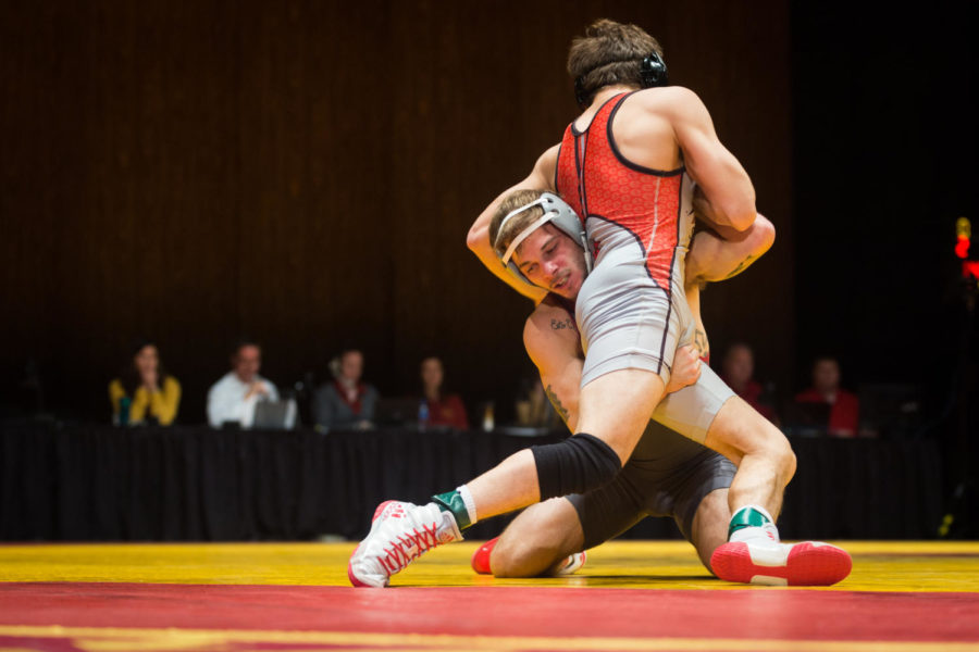 Then-redshirt sophomore Alex Mackall wrestles Austin Macias during the Iowa State vs SIU-Edwardsville match Nov. 11, 2018, in Stephens Auditorium. The Cyclones won nine of the 10 matches over the Cougars.