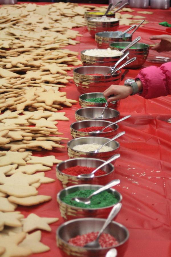 People of all ages gather in the Trophy Tavern to decorate holiday cookies during WinterFest on Dec. 2. 
