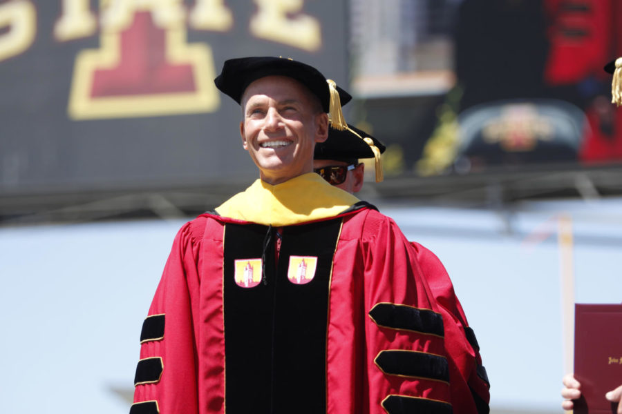 Dennis Muilenburg, Chairman, President and CEO of the Boeing Company and Iowa State Alumnus, smiles as he is presented with an honorary Doctor of Science. Muilenburg was also the guest speaker for the commencement ceremony.
