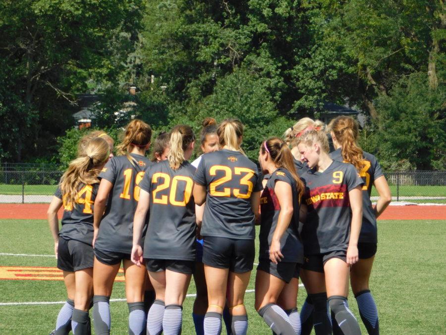 The Cyclone girls soccer team in a huddle before overtime begins against the Milwaukee Panthers on Sept. 9. The girls ended up losing during overtime 3-2 against the Panthers.