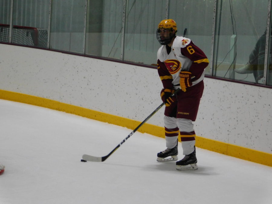 Nick Sandy, senior defenseman, surveys play during the game against the Ohio Bobcats at the Ames/ISU Ice Arena on Oct. 19. The Cyclones fought hard but ended with a 4-1 loss.