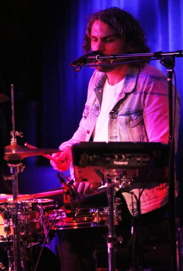 Chris Farney plays drums for Jon McLaughlin and Matt Wertz during their set at the Maintenance Shop on Nov. 15 for their Win/Win tour. McLaughlin and Wertz played separately and together during this seated show.