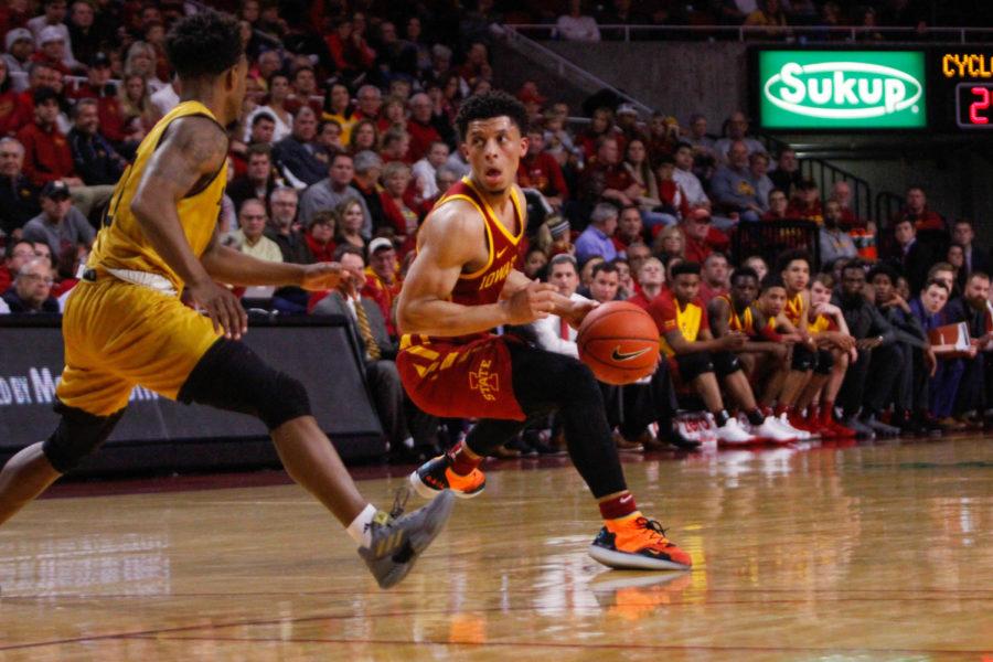 Sophomore Lindell Wigginton moves the ball down the court during the first half of the Iowa State vs. Alabama State game on Nov. 6 at the Hilton Coliseum. The Cyclones won 79-53. 