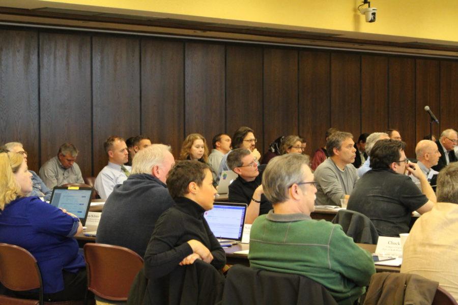 Iowa State faculty gathers at the senate faculty meeting held in the Memorial Union on Oct. 9, 2018. The senate faculty meetings are held monthly on Tuesdays.