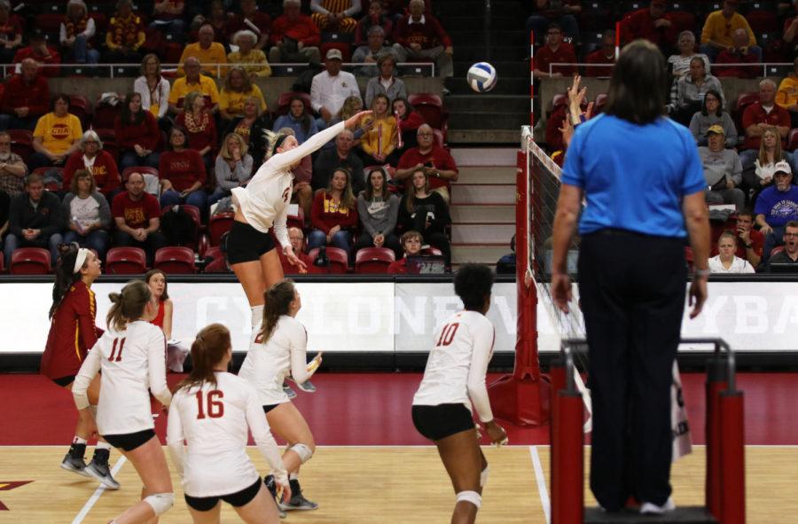 Outside hitter Jess Schaben jumps to hit the ball towards Kansas State during the game at Hilton Coliseum on Oct. 26. The Cyclones won 3-1.