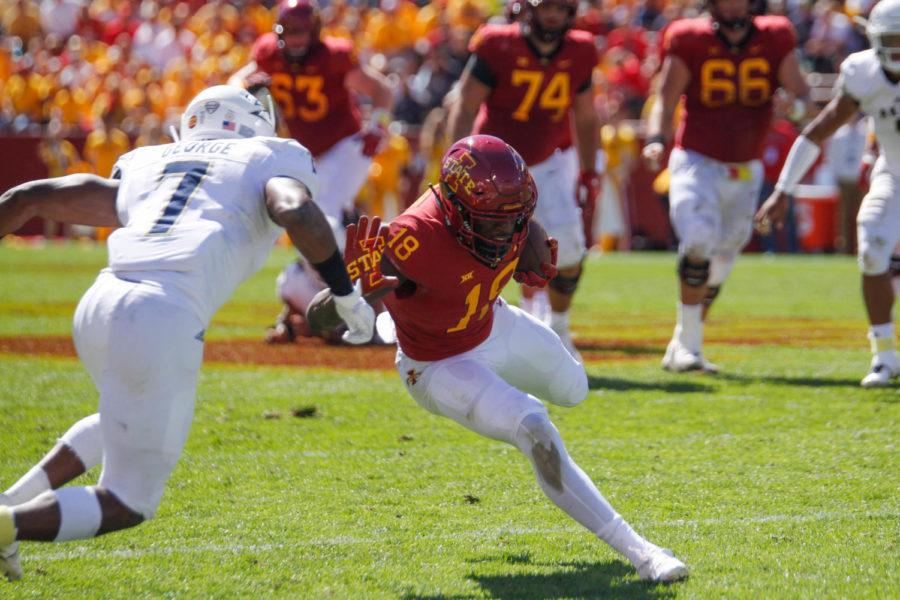 Wide receiver Hakeem Butler plows past Akrons players during the ISU vs. Akron game on Sept. 22 at Jack Trice Stadium. The Cyclones won 26-13.