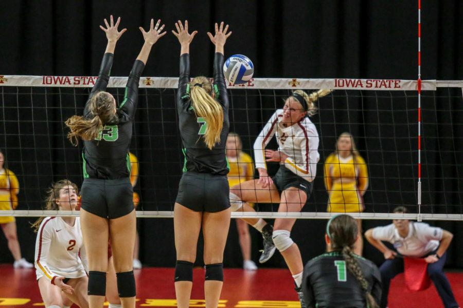 Jess+Schaben+powers+through+North+Texas+block+on+Dec.+5+in+Hilton+Coliseum.+Iowa+State+won+3-1+and+is+advancing+to+the+NIVC+semifinals.%C2%A0