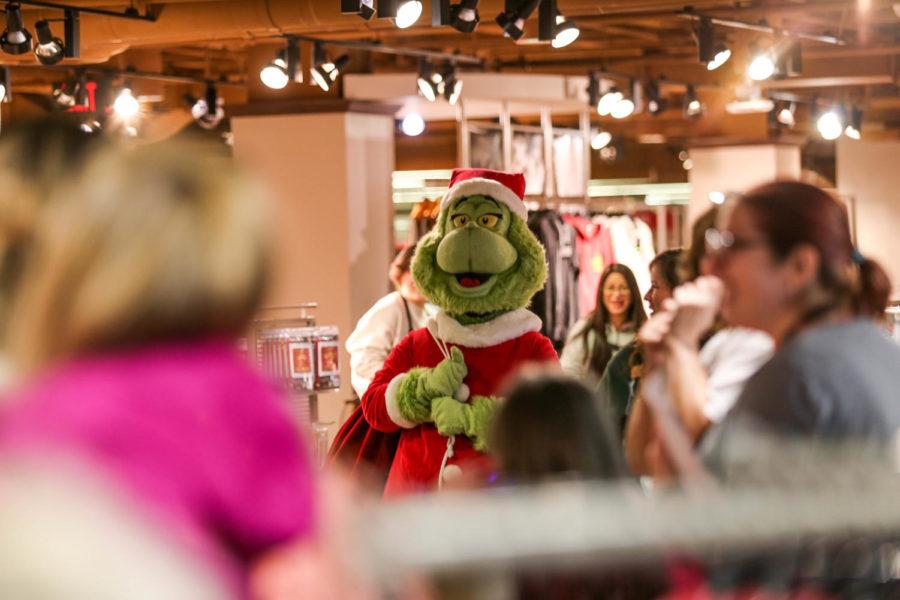 The Iowa State University Book Store hosted a story time with the Grinch on Dec. 1. Children were given coloring pages and Grinch t-shirts were available during the event. Children were also able to take photos with the Grinch.
