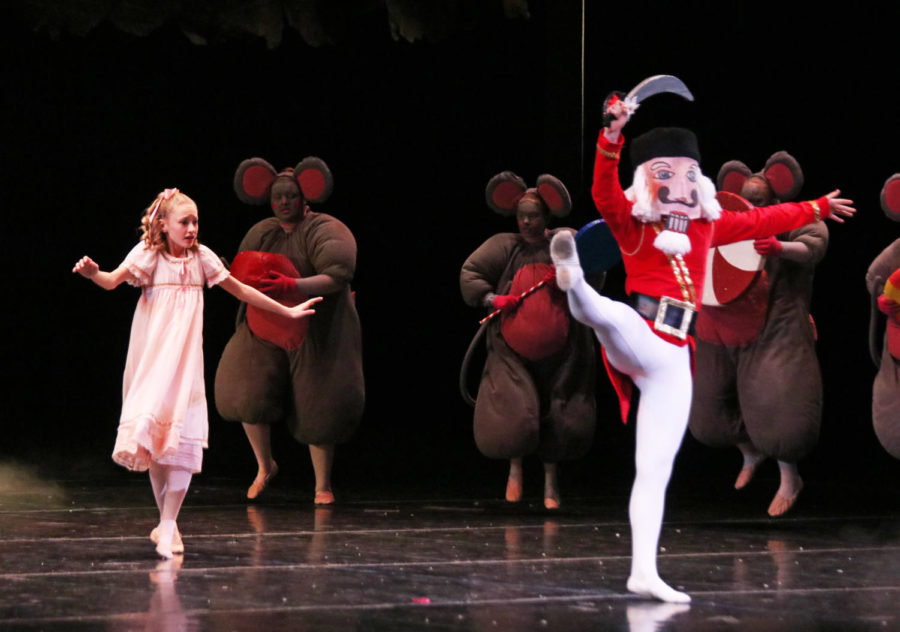 Clara looks on as the Nutcracker Prince protects her from the Mouse King and his mice during act one of “The Nutcracker” ballet performance on Dec. 8 at Stephens Auditorium. The 38th annual “The Nutcracker” ballet will continue to run at Stephens Auditorium on Dec. 8 at 7:30 p.m. and Dec. 9 at 1:30 p.m.