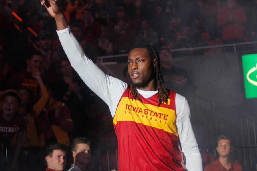 Junior Solomon Young waves to the crowd as he walks on to the court during Hilton Madness at Hilton Coliseum on October 12, 2018. 