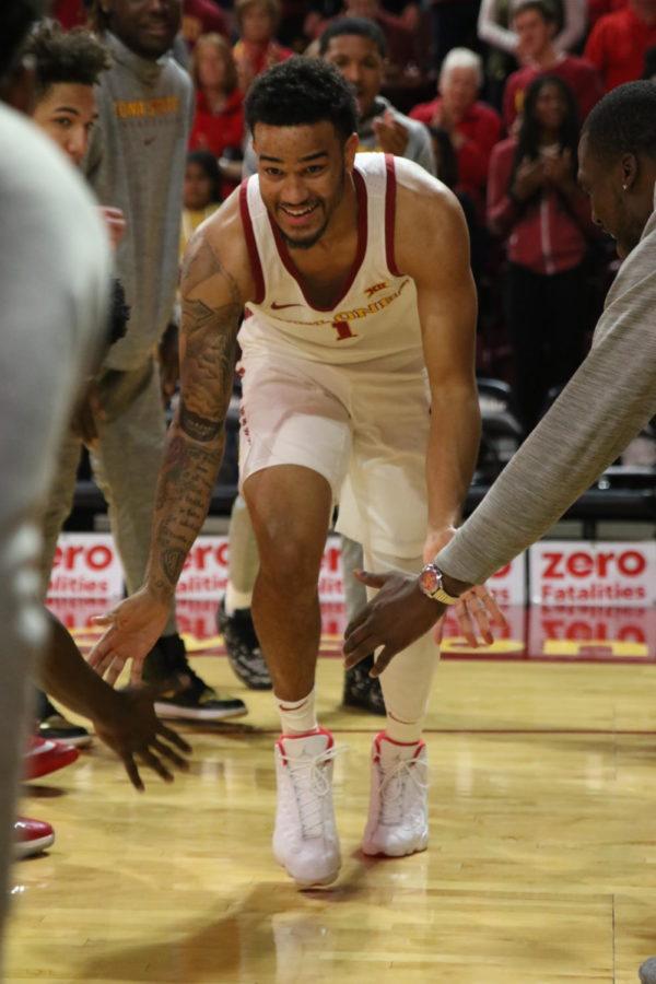 Iowa State senior Nick Weiler-Babb slaps the hands of teammates during player introductions on Nov. 26.