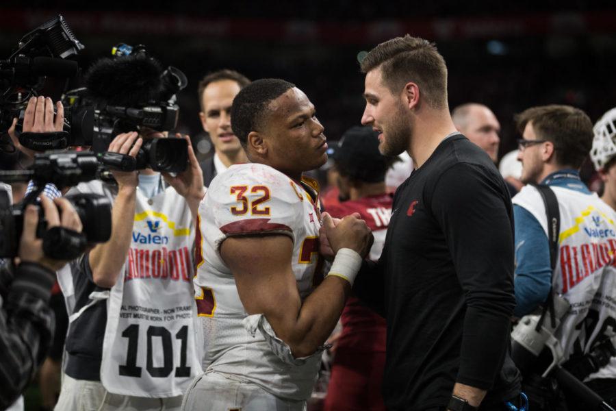 Junior running back David Montgomery talks with Washington state player following the conclusion of the Valero Alamo Bowl Dec. 29. The Cyclones were defeated 26 to 28.